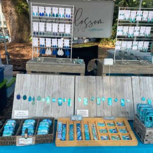 Beach Blossom Studio booth with a selection of jewelry and accessories