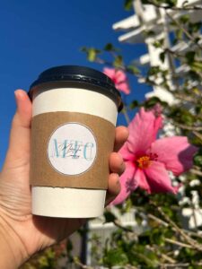 Hand holding tea in cup