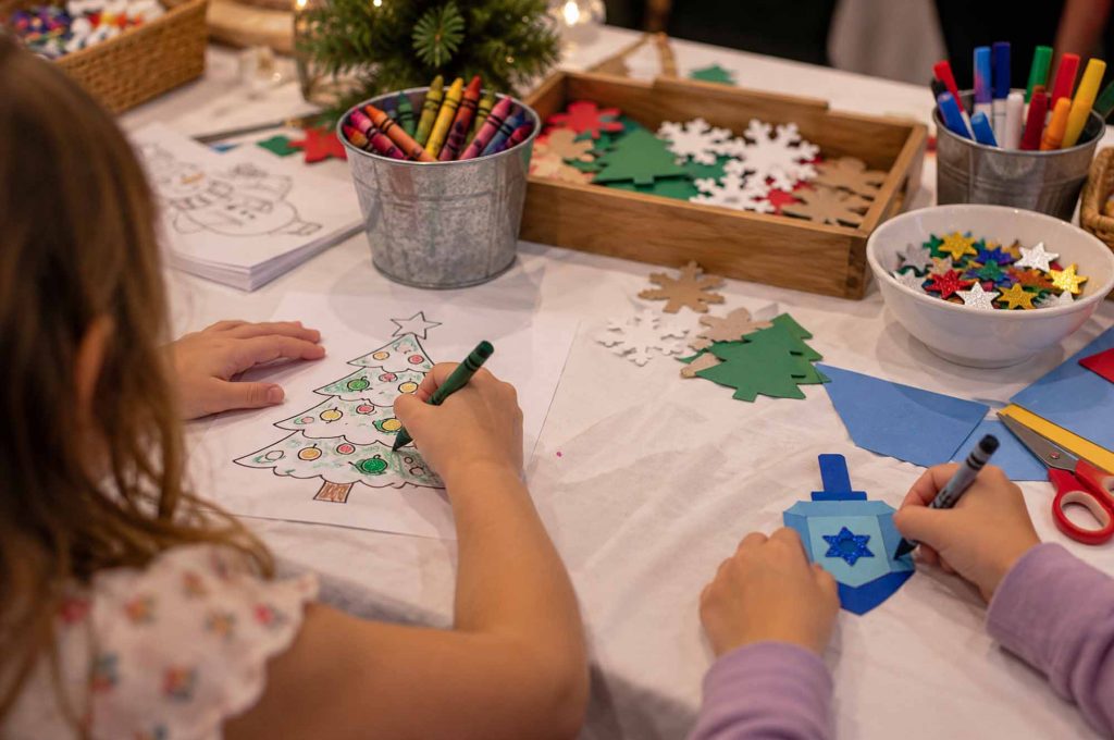 kids participating in holiday crafting activities